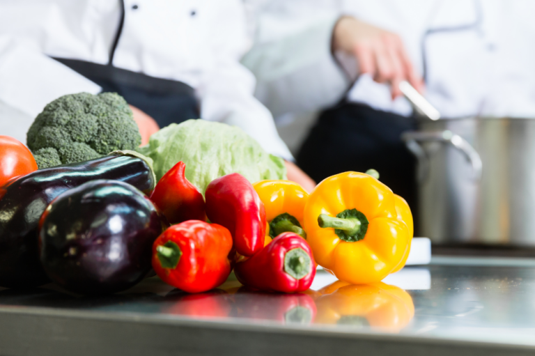 vegetables on a counter in a commercial kitchen